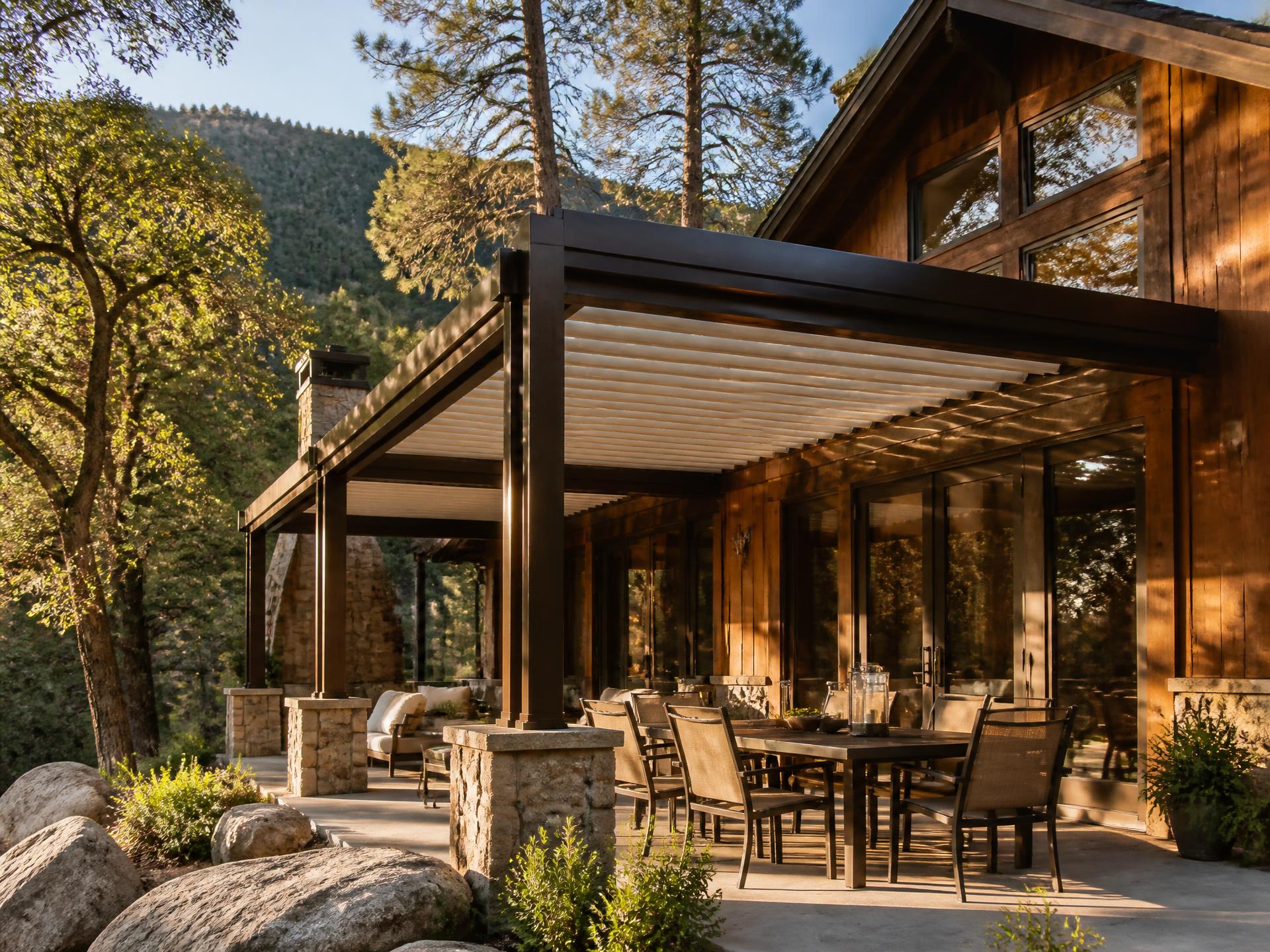 Custom louvered aluminum patio cover installed on a home in Oakhurst, CA
