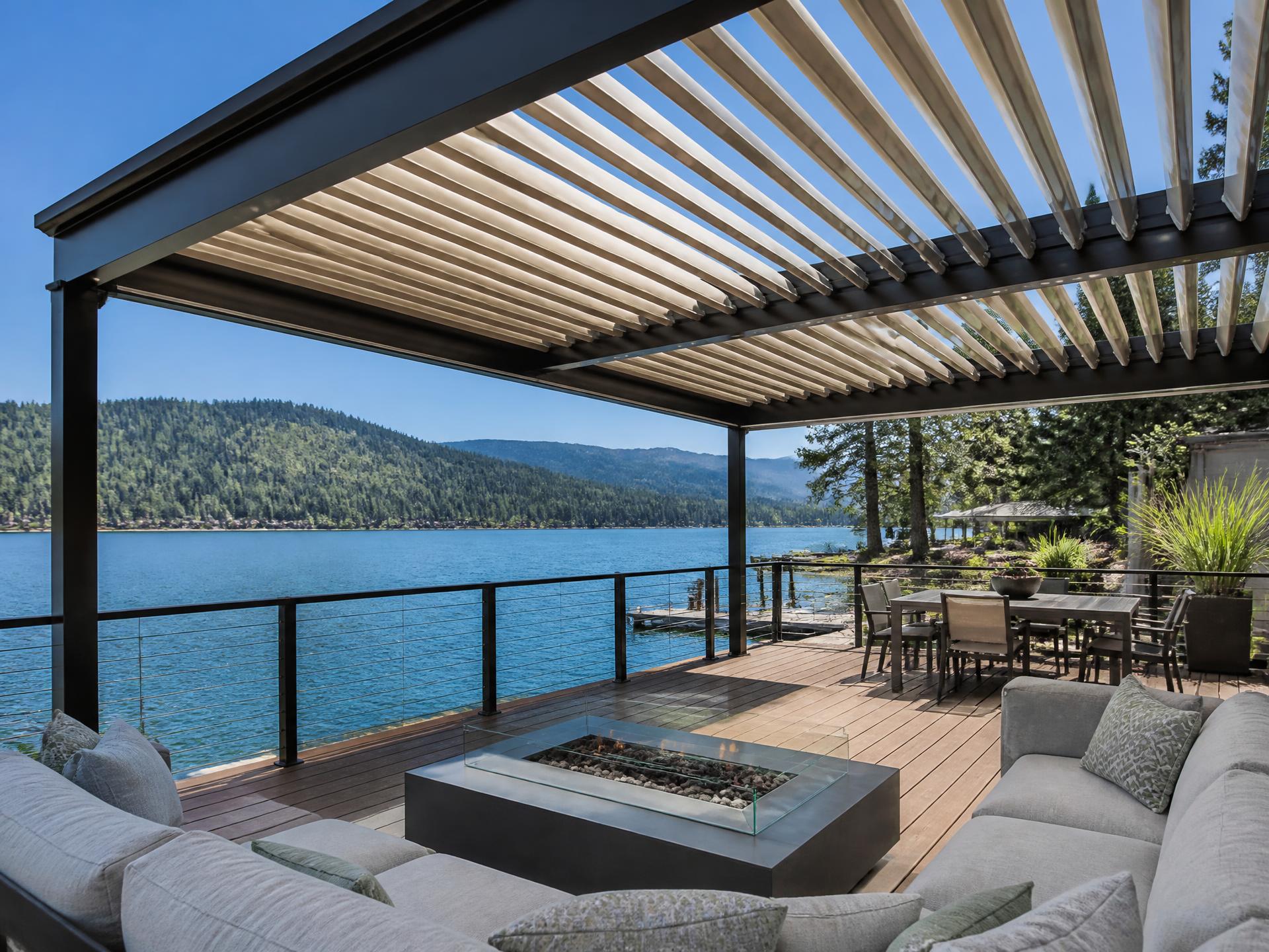 Custom louvered aluminum patio cover installed on a home in Bass Lake, CA