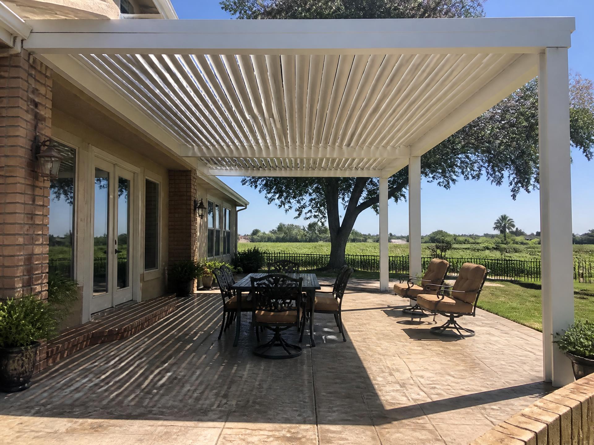 Adjustable louvered aluminum patio cover installed on a Selma, CA home