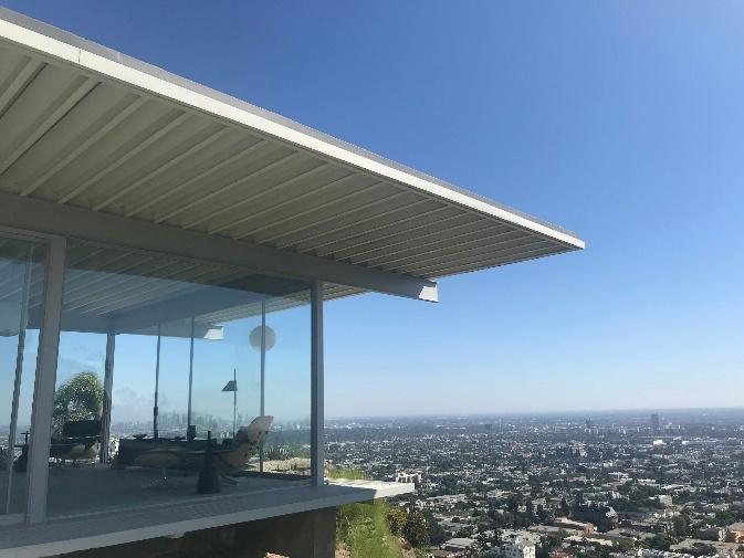 Aluminum patio cover installation in Oakhurst for a residential roof.