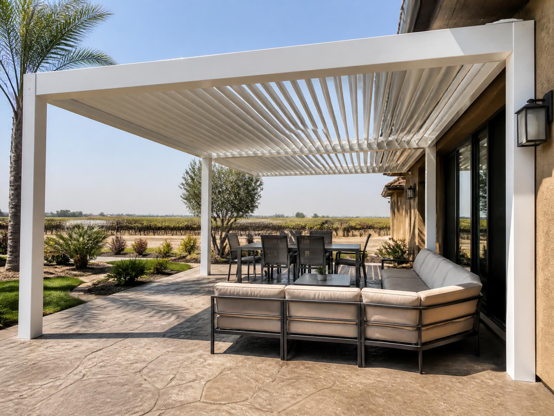 Custom louvered aluminum patio cover installed on a home in Madera, CA