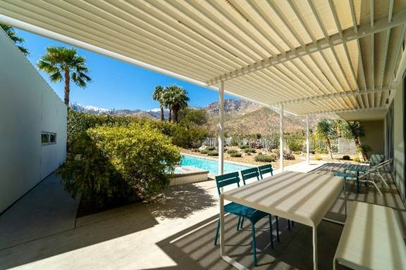 Modern outdoor space with stylish louvered patio covers